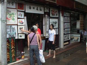 Shopping for art on Wen De Lu street.